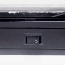Small on/off switch at the bottom